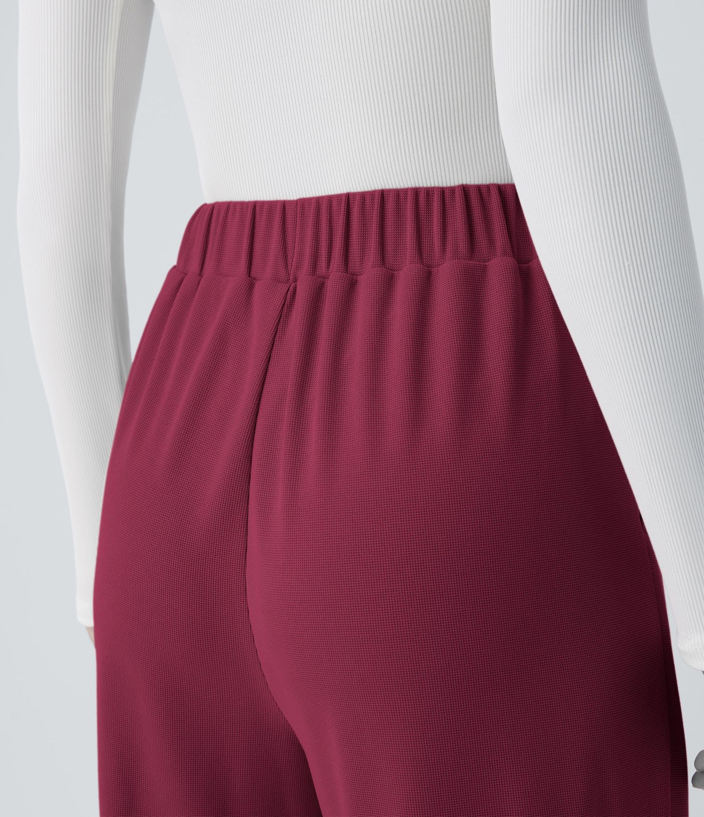 Pantalón tiro alto botón bolsillo lateral plisado pierna ancha