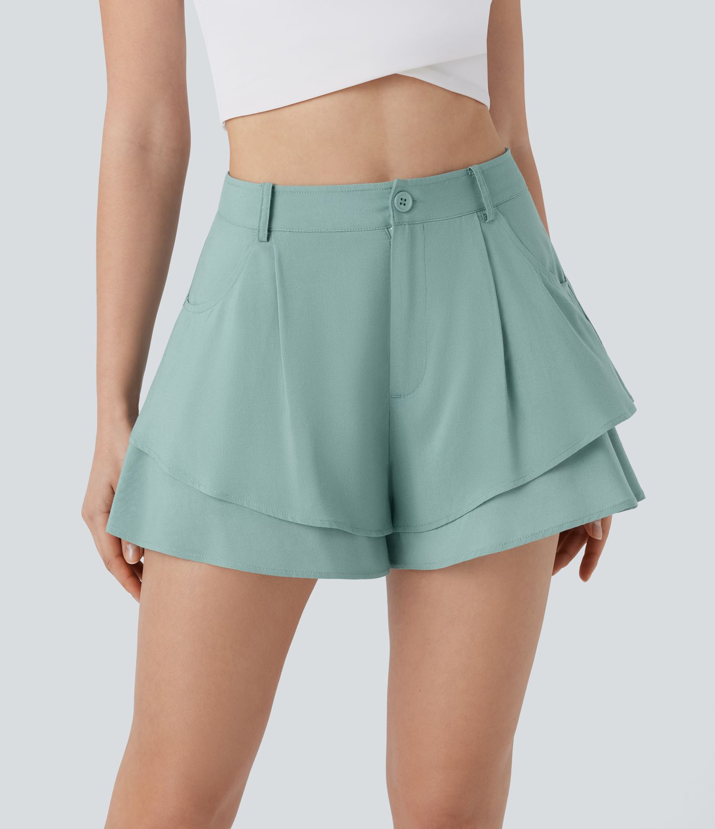 Pantalón corto resort tiro alto botón cremallera bolsillo lateral capa