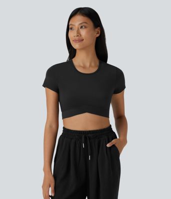 Top sportivo corto SoftlyZero™ con bordo incrociato