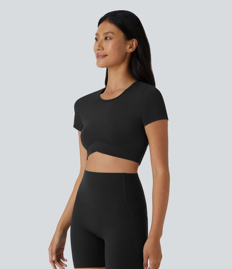 Top sportivo corto SoftlyZero™ con bordo incrociato