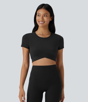Top sportivo corto SoftlyZero™ con bordo incrociato