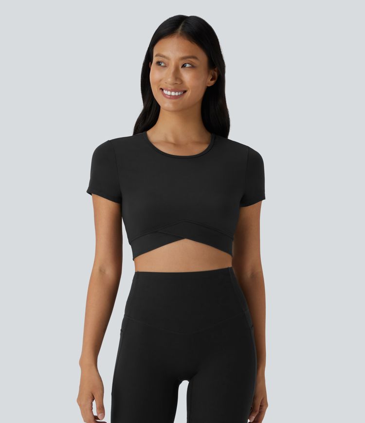 Top sportivo corto SoftlyZero™ con bordo incrociato