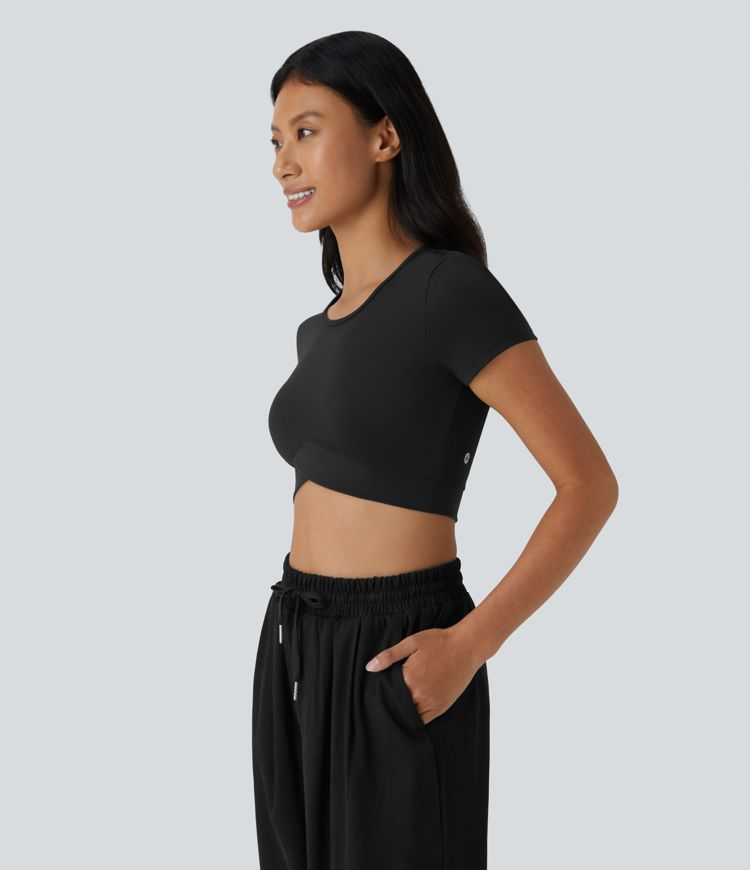 Top sportivo corto SoftlyZero™ con bordo incrociato