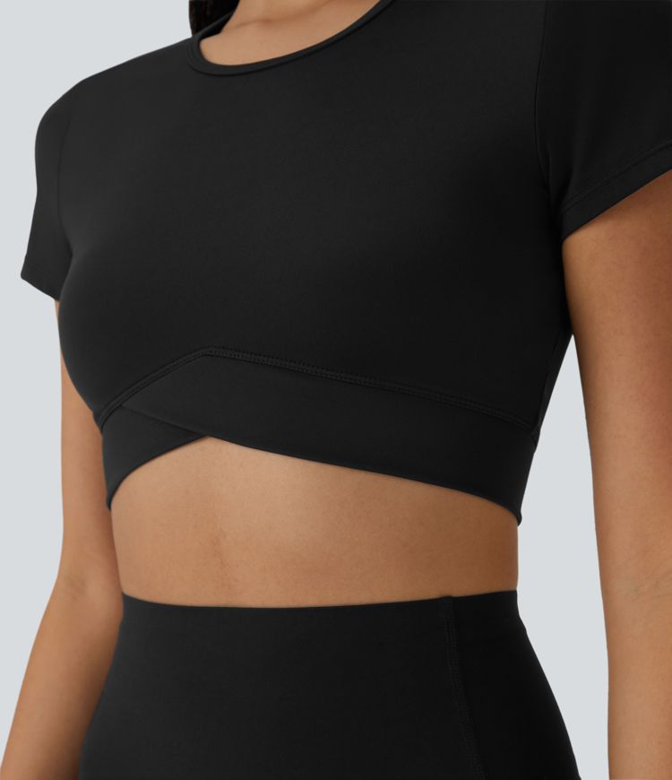 Top sportivo corto SoftlyZero™ con bordo incrociato