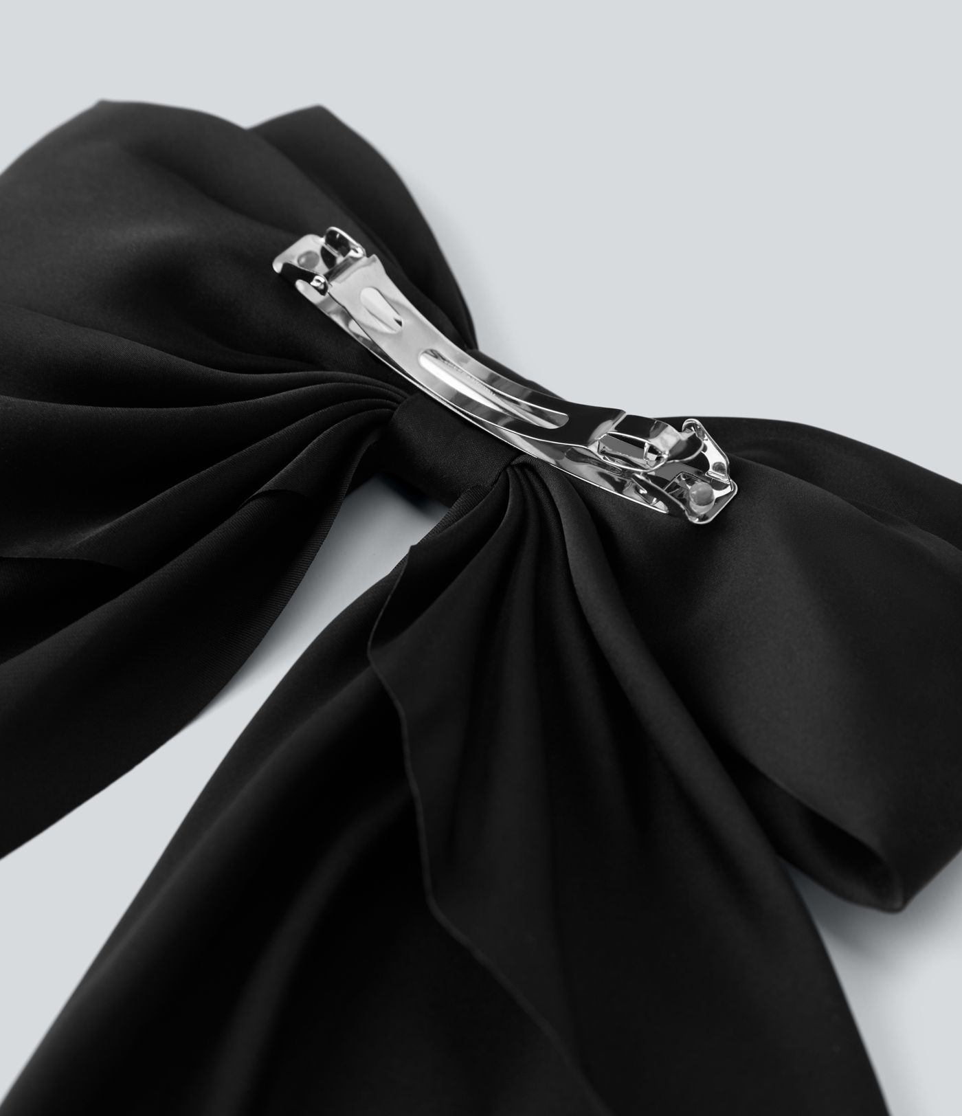 Pinza pelo metal forma lazo cola larga