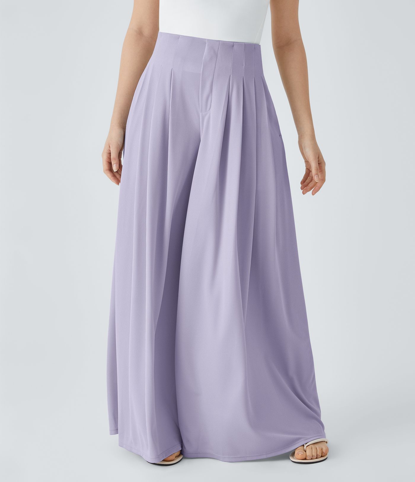 Fließende Palazzo-Hose mit hohem Bund, Seitentaschen, Waffelstruktur und weitem Bein