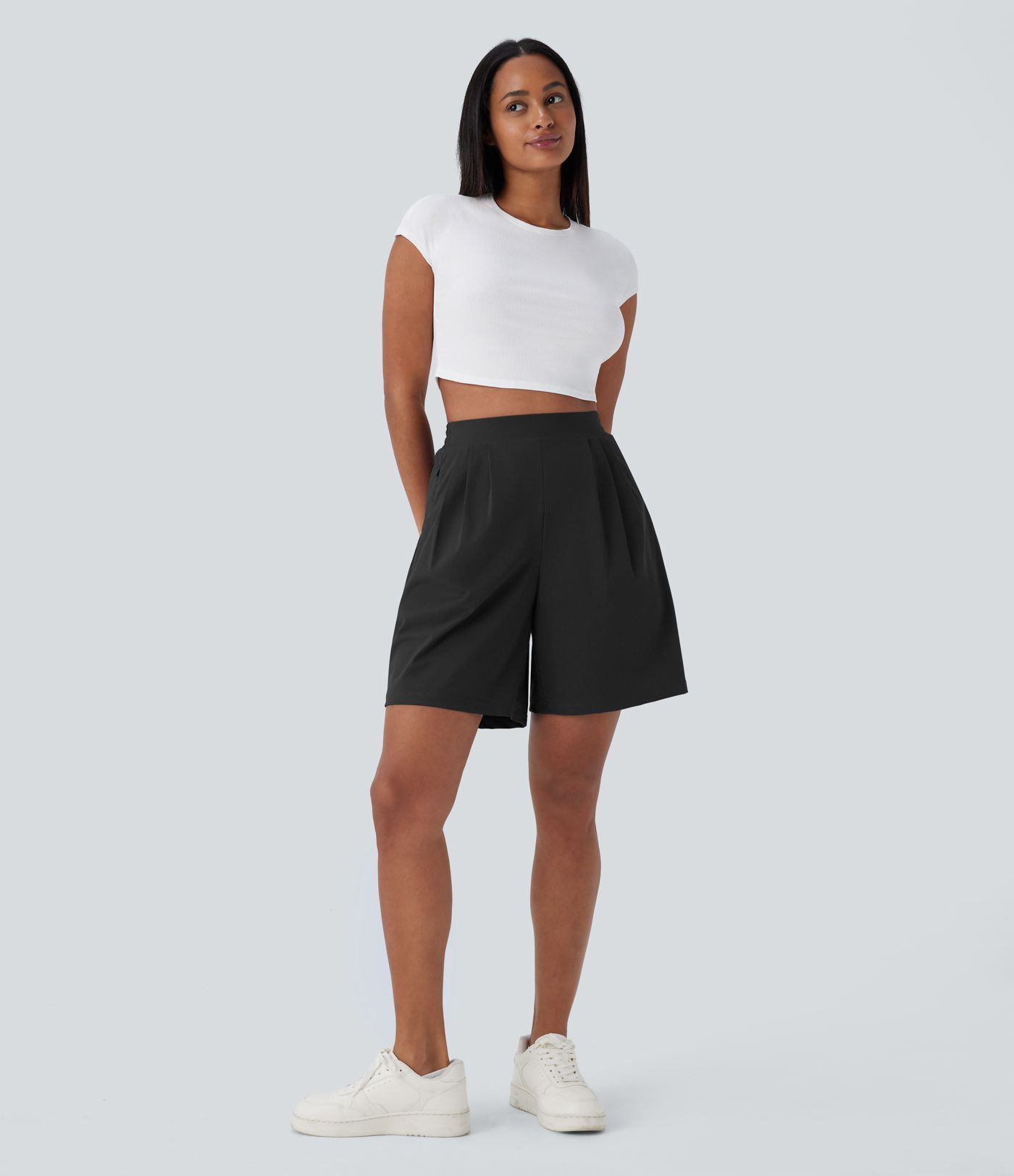 Short bermuda taille haute avec poches zippées sur les côtés pour le travail