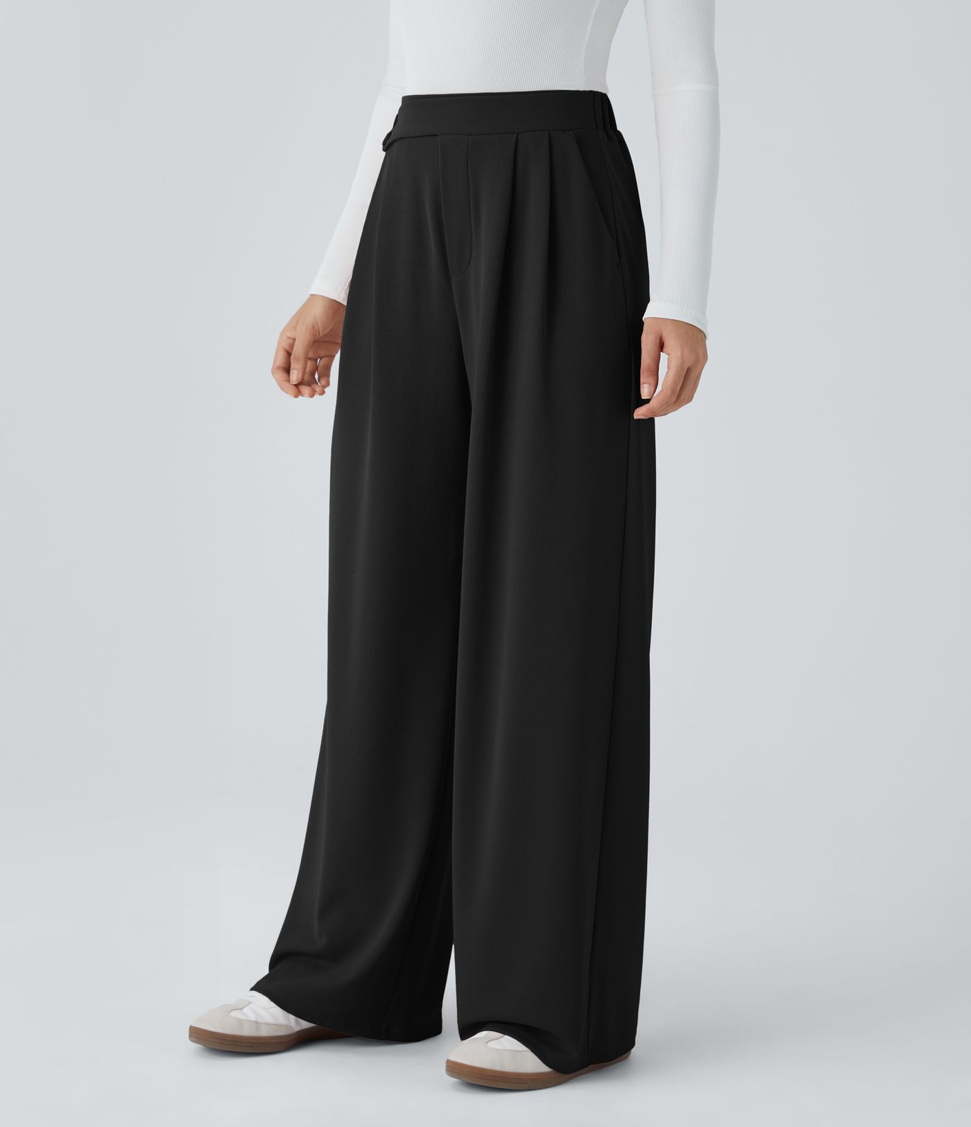 Pantalón tiro alto botón bolsillo lateral plisado pierna ancha