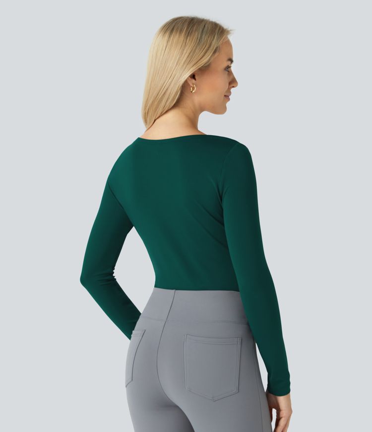 Blusa oficina cuello asimétrico manga larga dobladillo curvo