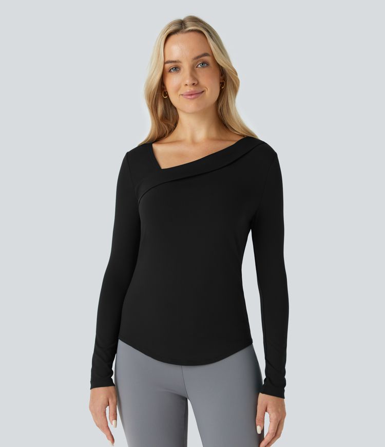 Top asymétrique à manches longues et ourlet arrondi