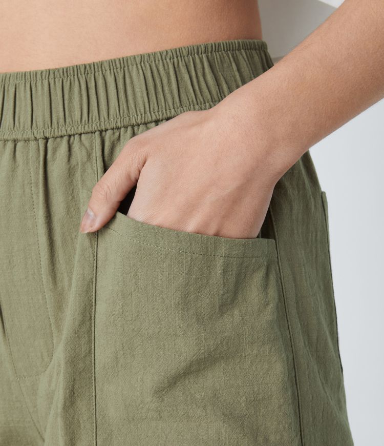 Pantalones cortos tacto lino dobladillo enrollado múltiple bolsillo tiro alto