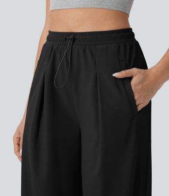 Højtaljede, rette bukser med lommer, mikrowaffle-struktur og afslappet pasform