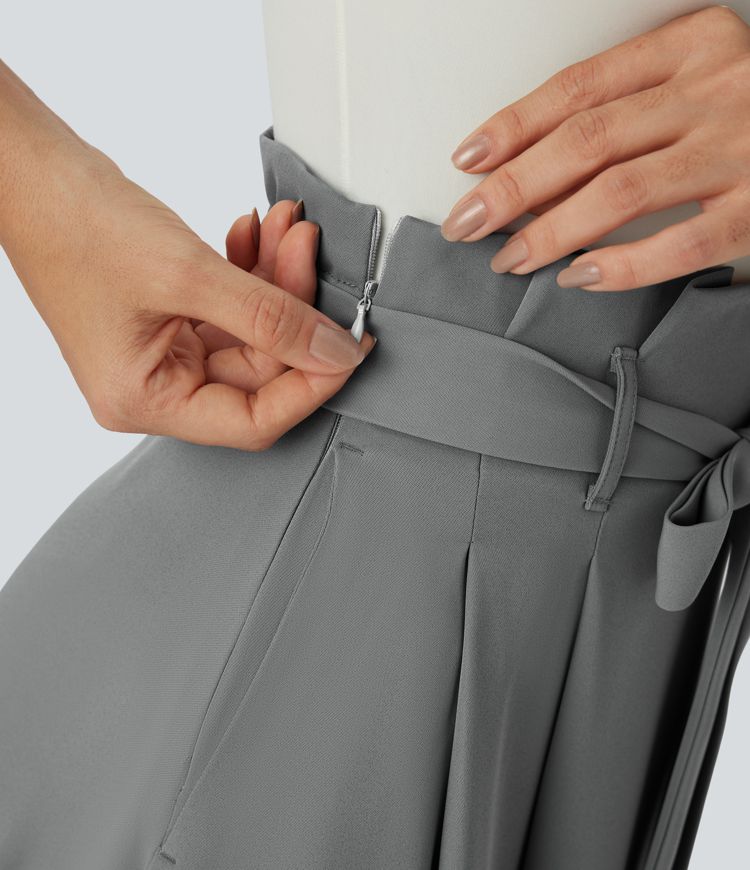 Paper bag high waist skirt with belt, side pockets and handkerchief hem, midi length