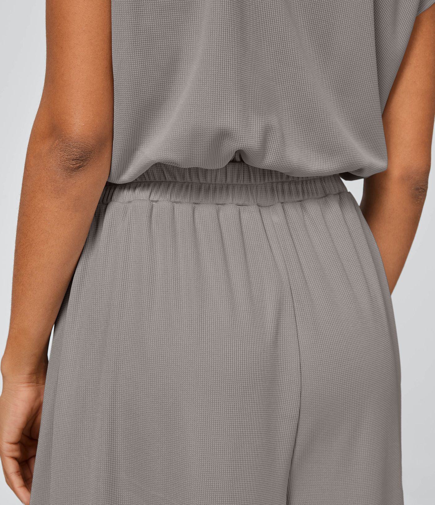 Combinaison Casual Col en V Jambes Large Plissée Manches Courtes Poche Latérale Gaufrée Fluide