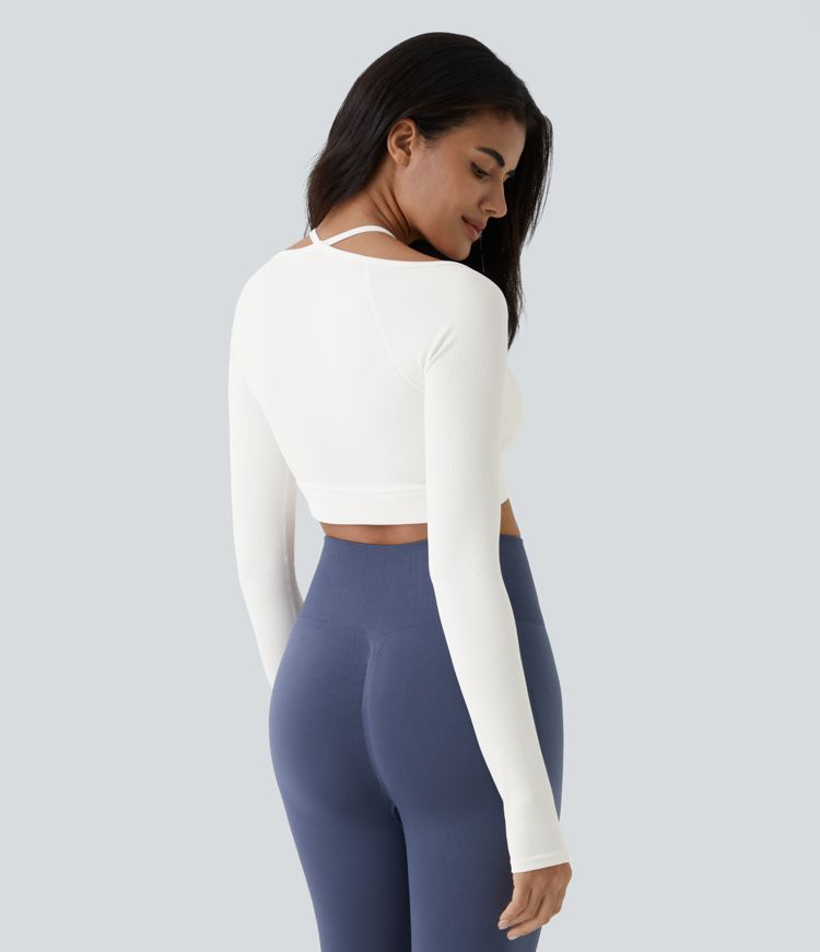 Top deportivo abierto con agujeros para el pulgar y cuello tipo halter