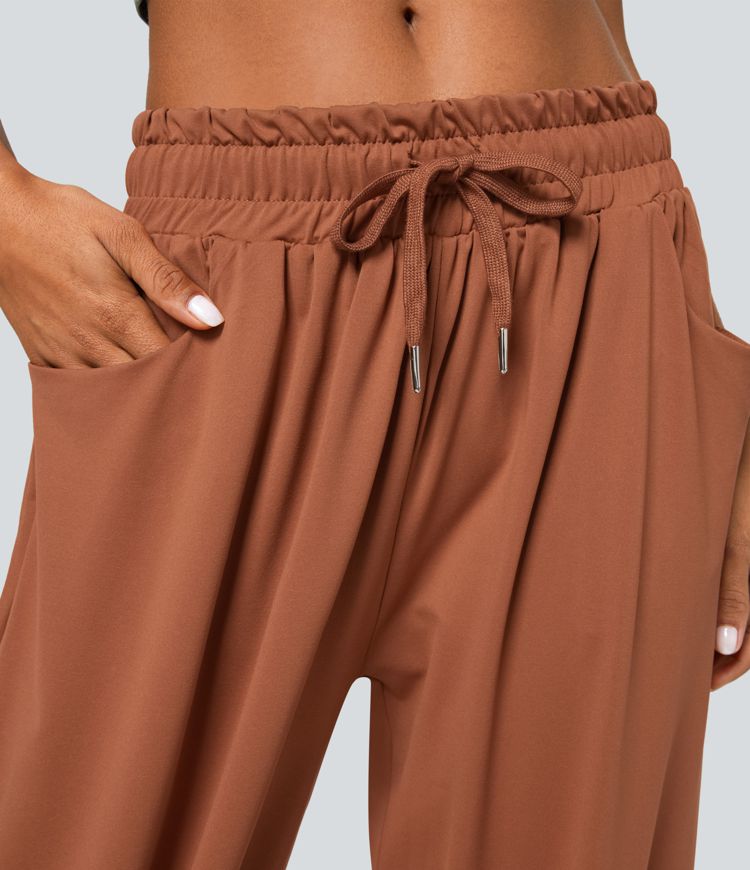 Joggers bohemios bolsillo lateral plisado cordón tiro bajo