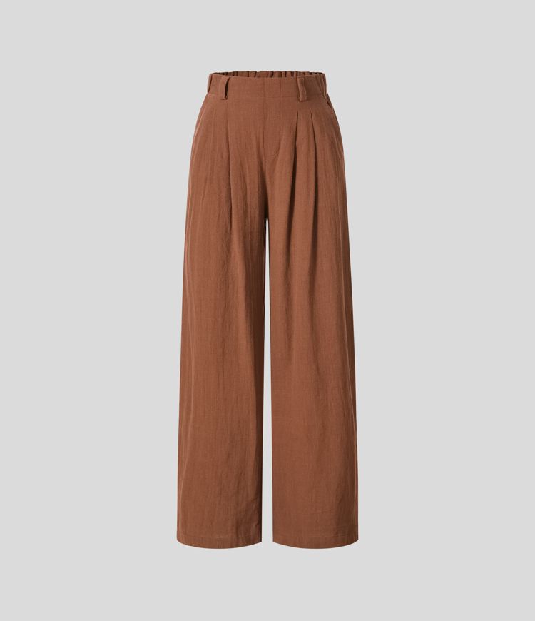 High-waisted trousers with pleated side pockets and wide legs