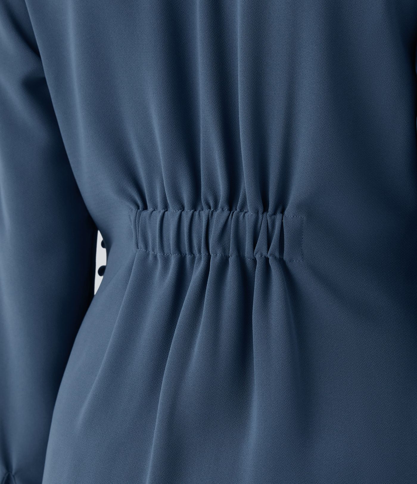 Wrap-front work blouse with V-neckline, ruffles, long sleeves and a slit.