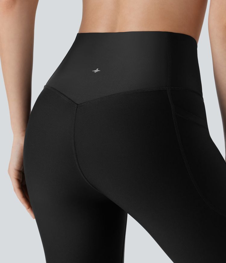 Leggins de entrenamiento de cintura alta SoCinched con control de abdomen, bolsillos y acabado brillante