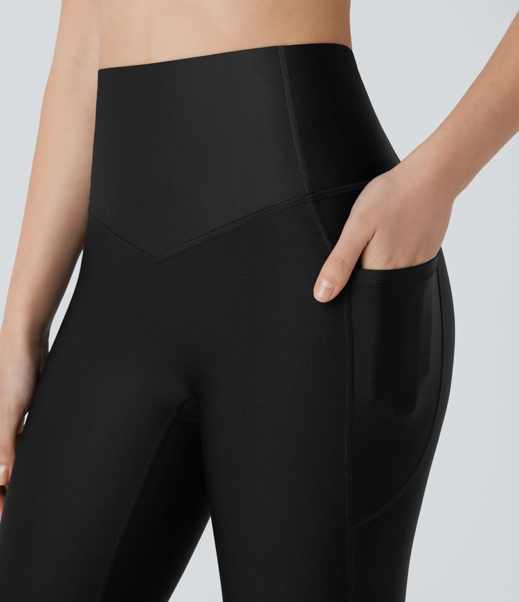 Leggins de entrenamiento de cintura alta SoCinched con control de abdomen, bolsillos y acabado brillante