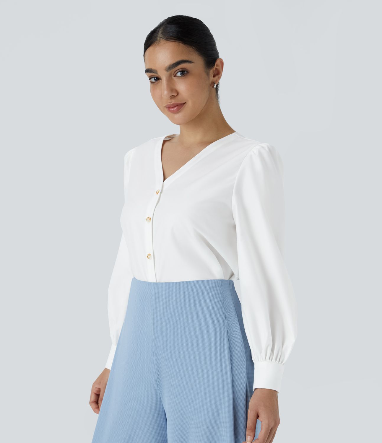 Long-sleeved work blouse with a V-neck and buttons