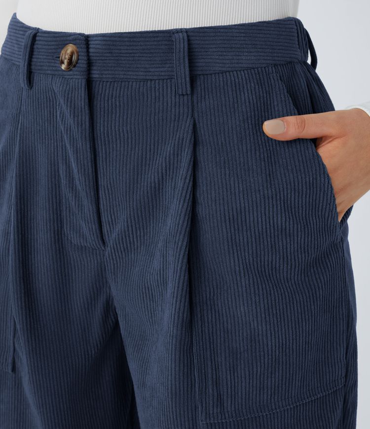 Casual corduroy jogger pants with mid-rise waist, button, zipper, and multiple pockets