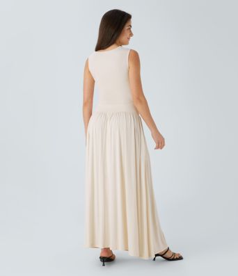 Casual maxi dress with boat neckline, asymmetrical straps, gathered sides and pockets