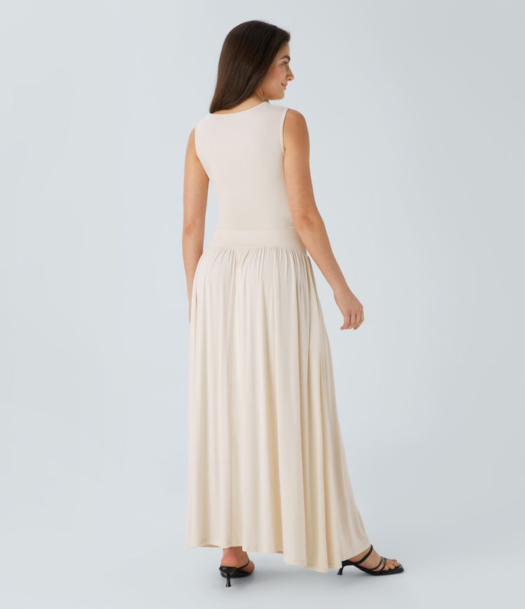 Casual maxi dress with boat neckline, asymmetrical straps, gathered sides and pockets