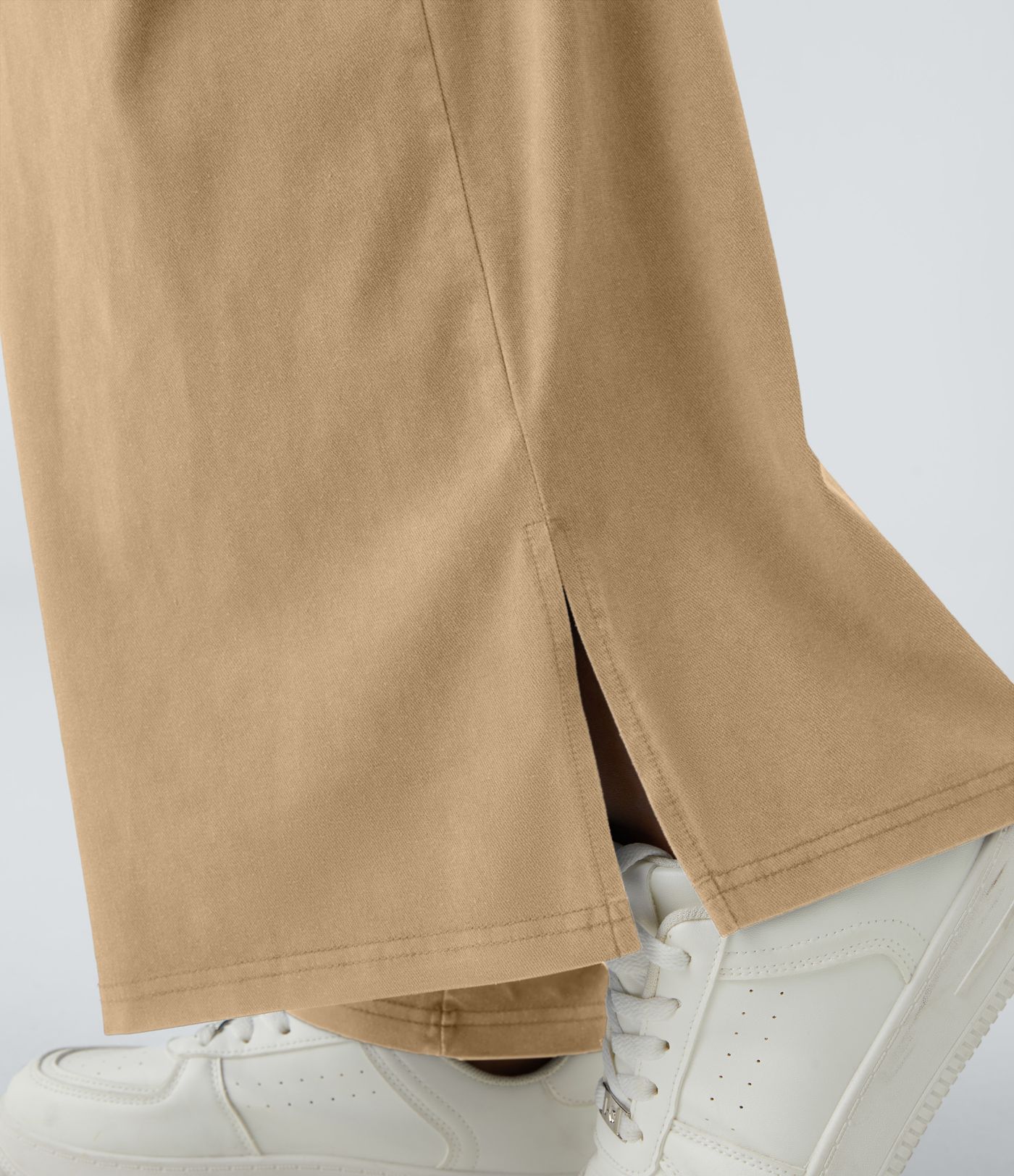 Pantalón ancho tiro alto plisado bolsillo lateral dobladillo dividido cremallera botón