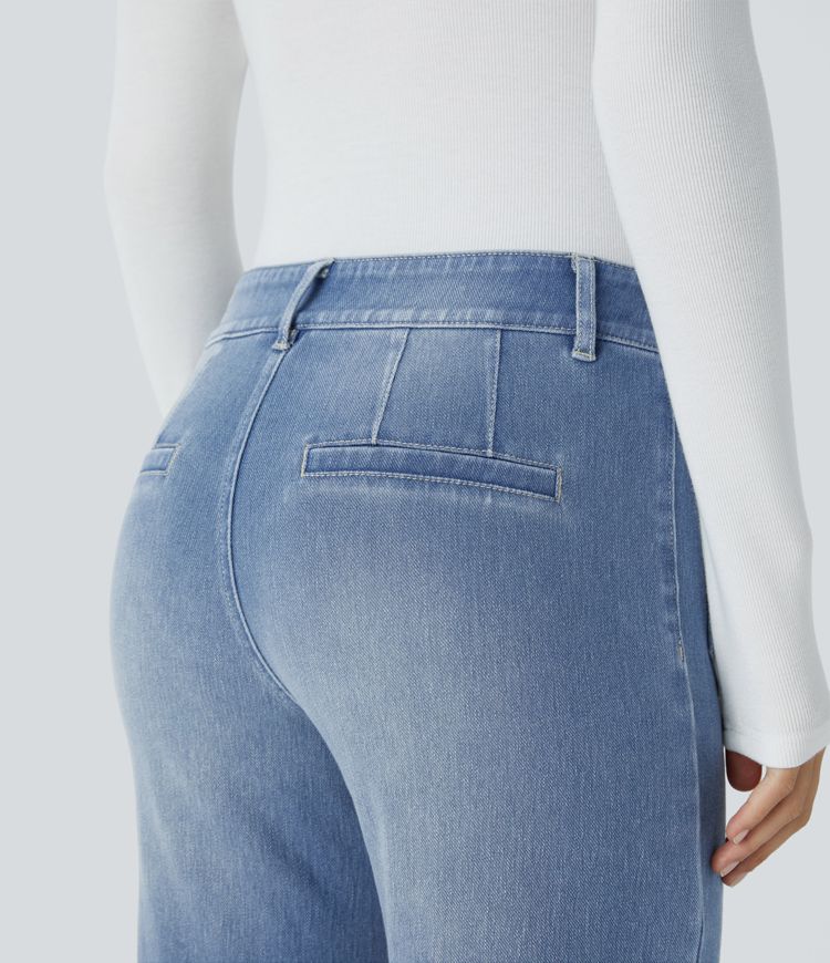 Jean décontracté délavé taille basse en maille extensible, coupe droite avec poches avant et fermeture zippée