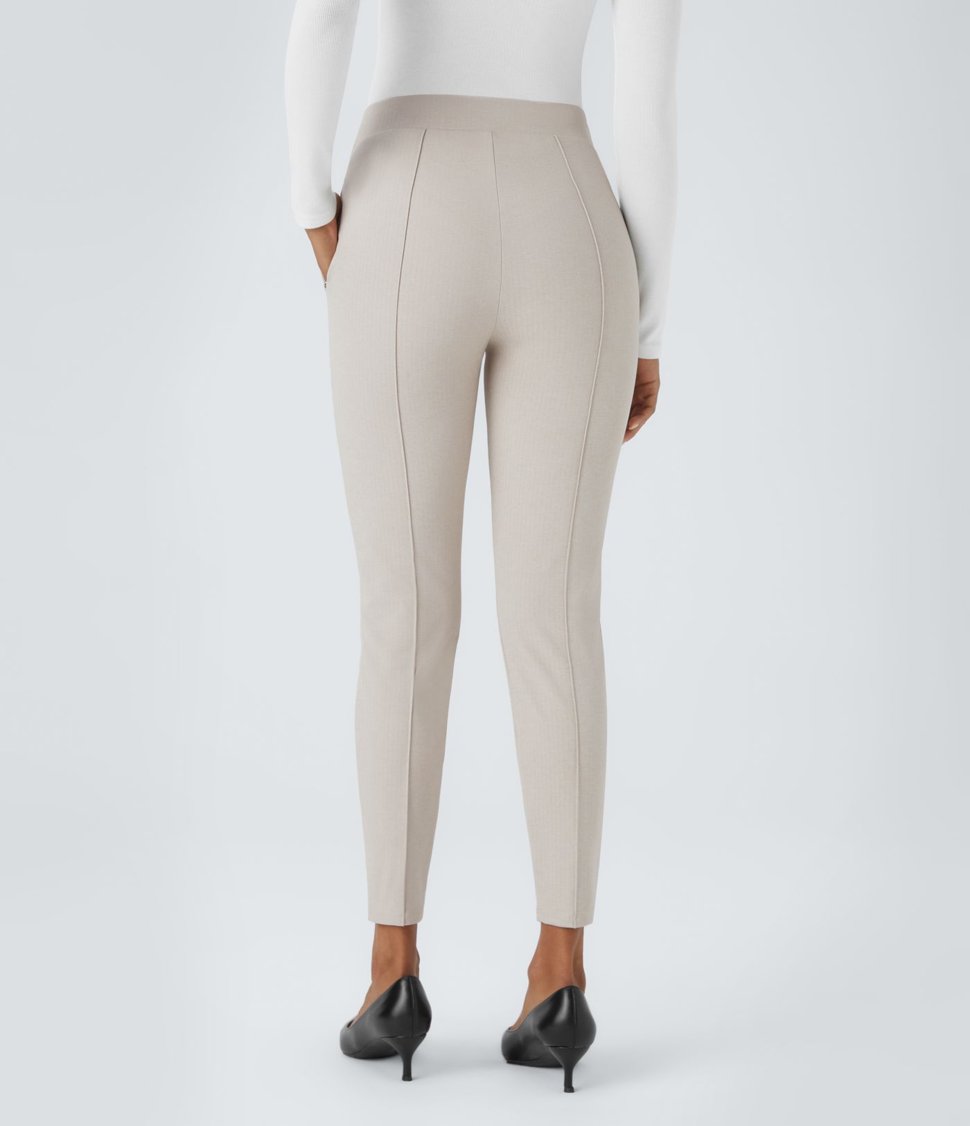 Halara Flex™ work leggings with a high-rise waistband, zippered side pockets, and a herringbone pattern