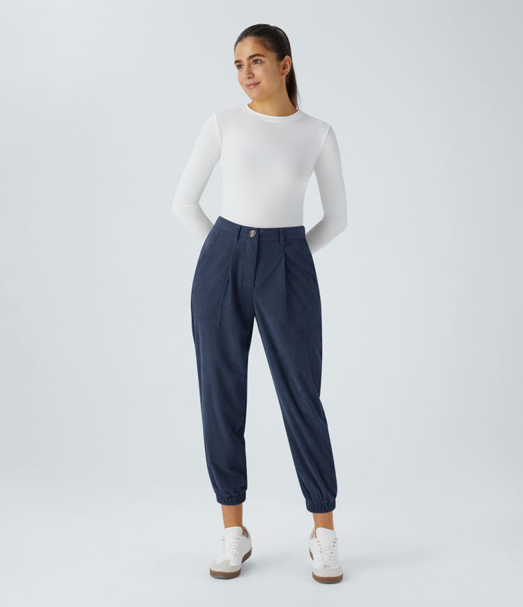 Casual corduroy jogger pants with mid-rise waist, button, zipper, and multiple pockets