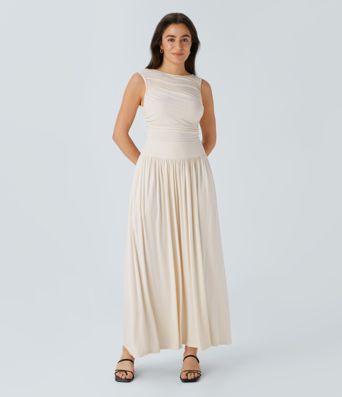 Casual maxi dress with boat neckline, asymmetrical straps, gathered sides and pockets