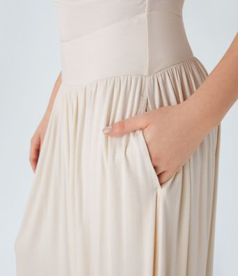 Casual maxi dress with boat neckline, asymmetrical straps, gathered sides and pockets