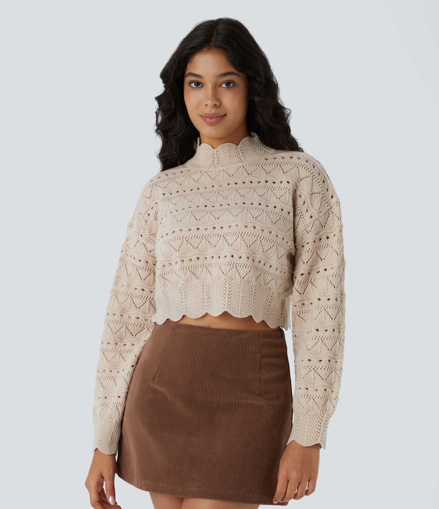 Kõrge kaelusega, piiskopi varrukatega, lainelise äärega, lahtise silmkoega vabaajakinnas