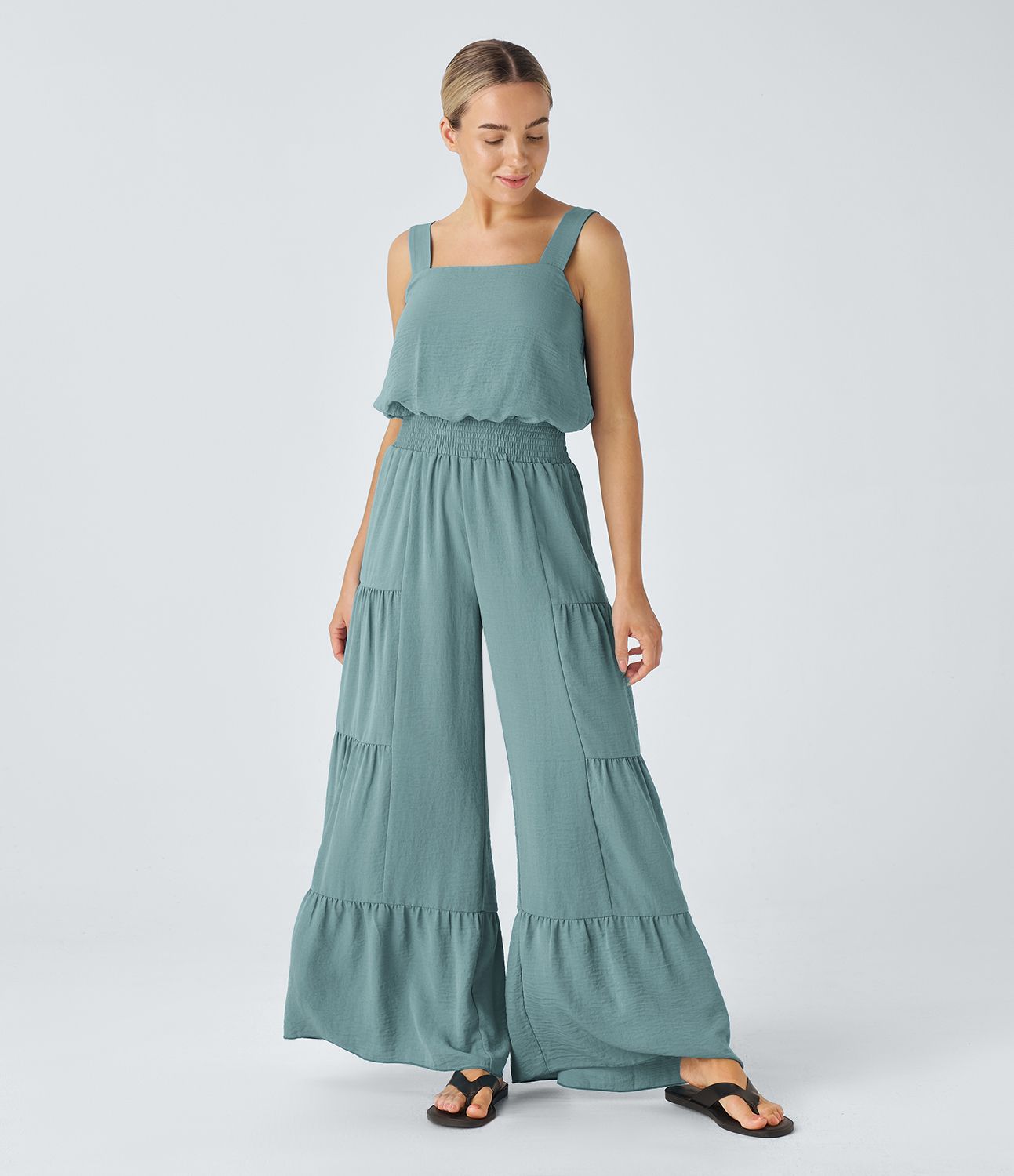 Mono resort fluido tacto lino cuello cuadrado sin espalda bolsillo lateral pierna ancha