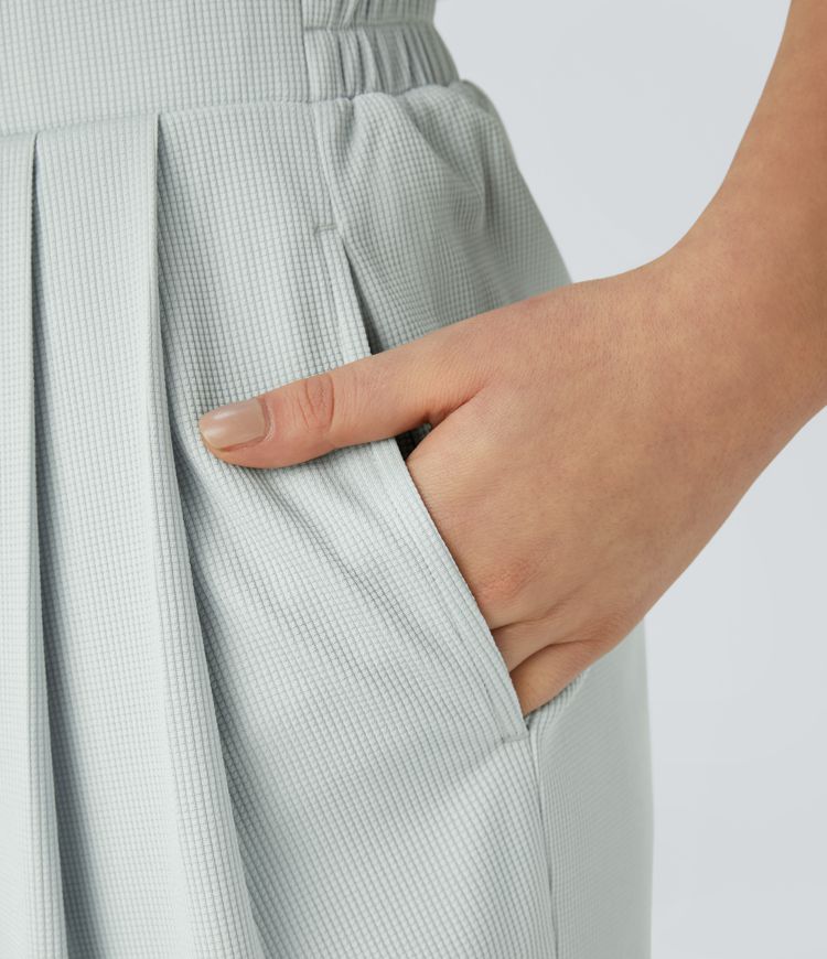 Mono jogger gofre bolsillo lateral plisado manga corta cuello V