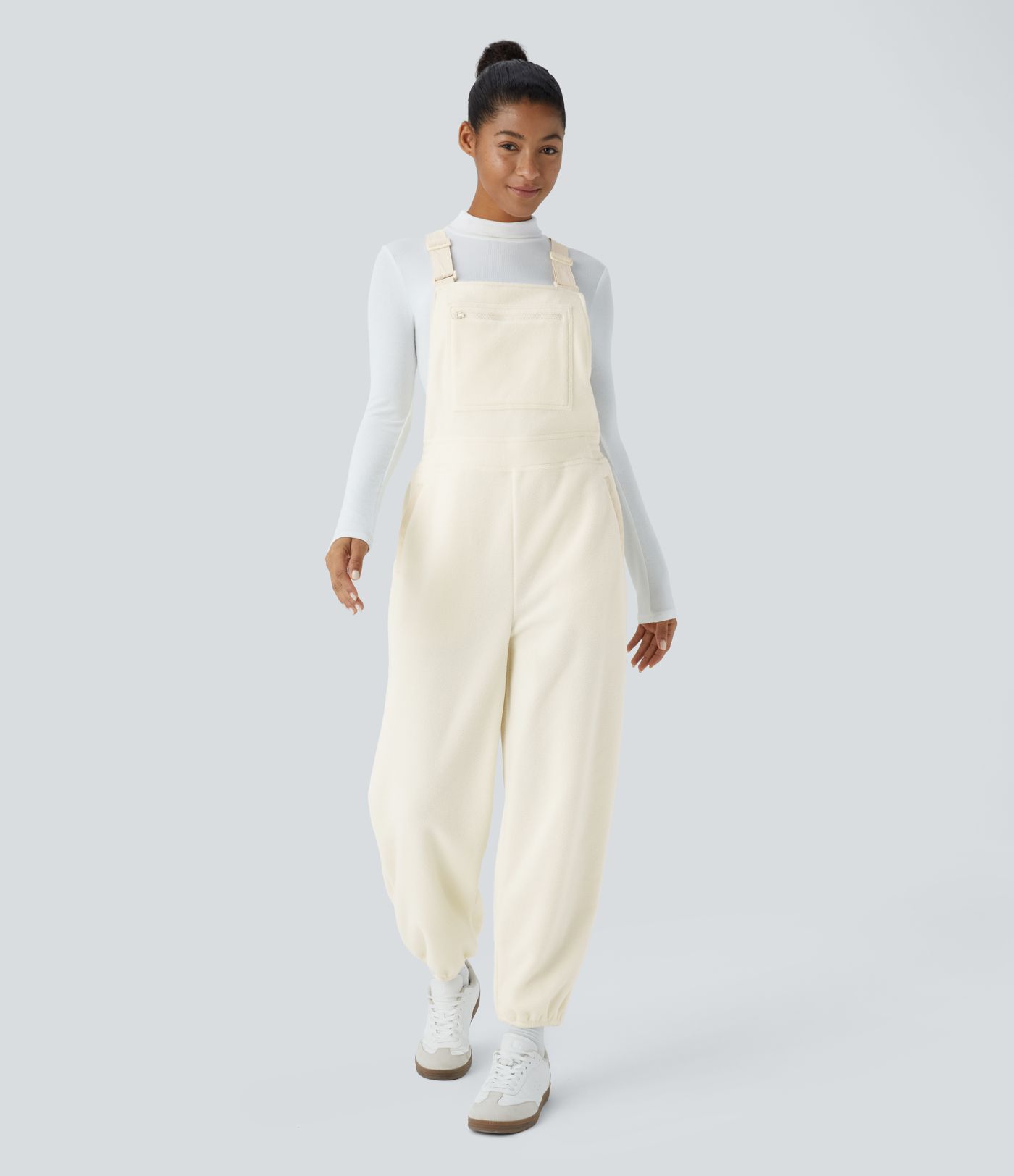 Mono deportivo polar múltiple bolsillo tirante ajustable