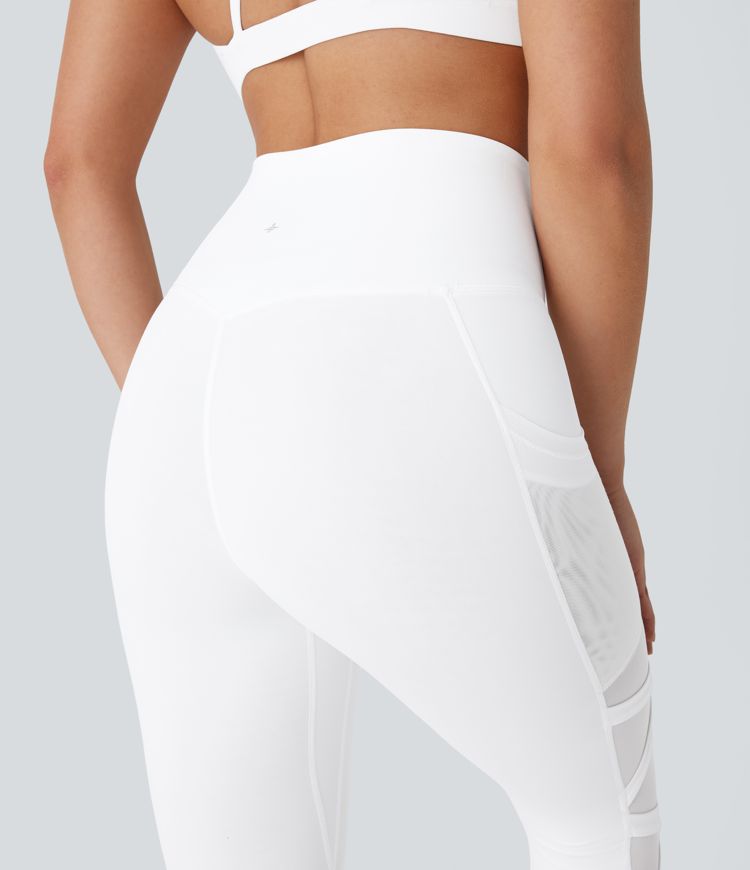 Leggings de yoga de tiro alto con secado rápido, malla en contraste y bolsillos laterales