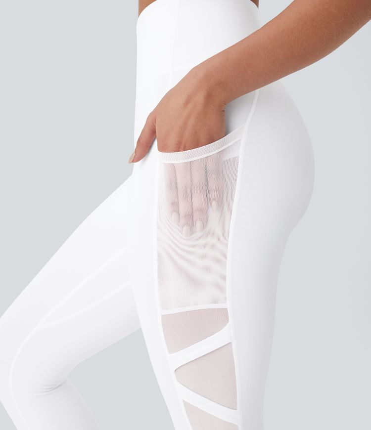 Leggings de yoga de tiro alto con secado rápido, malla en contraste y bolsillos laterales