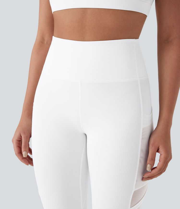 Leggings de yoga de tiro alto con secado rápido, malla en contraste y bolsillos laterales