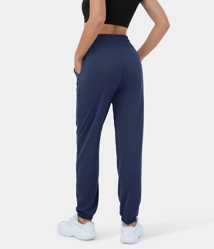 Pantalones deportivos casuales de cintura alta con bolsillos y cordón de algodón