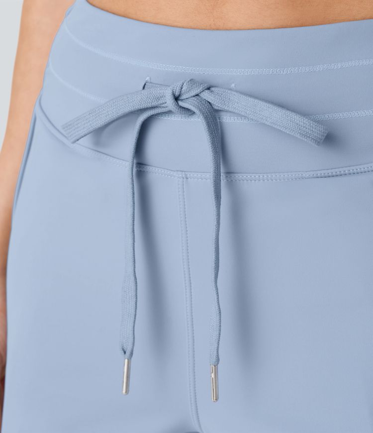 High waist drawstring multiple pocket curve hem yoga shorts