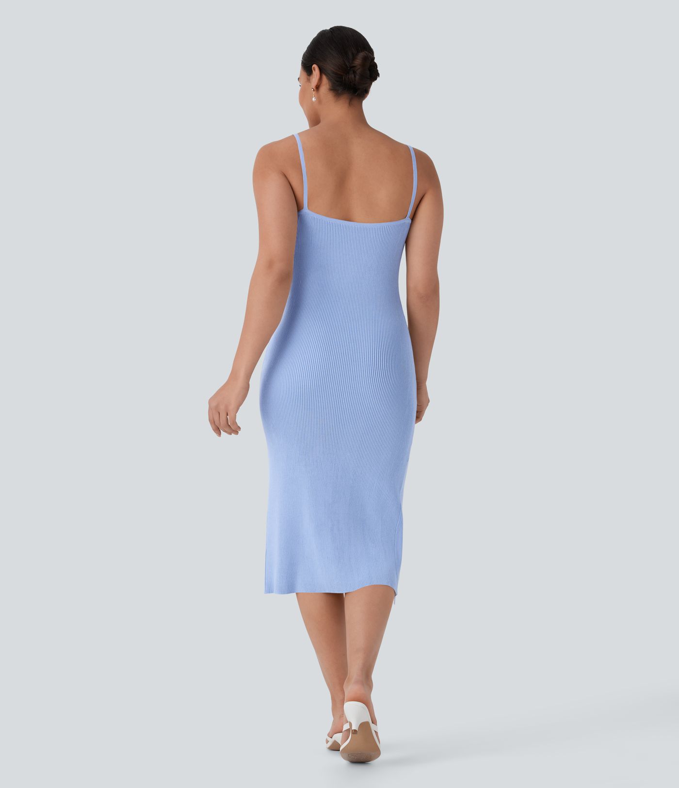 Vestido suéter ajustado abertura sin espalda resort