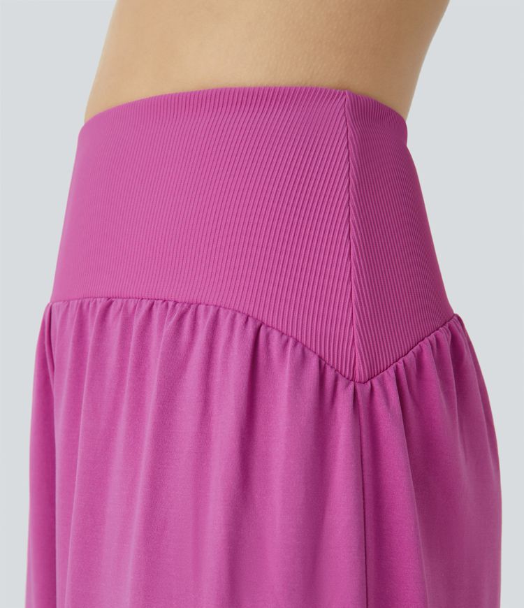 Pantalón yoga dobladillo curvo fruncido bolsillo lateral acanalado contrastante tiro alto