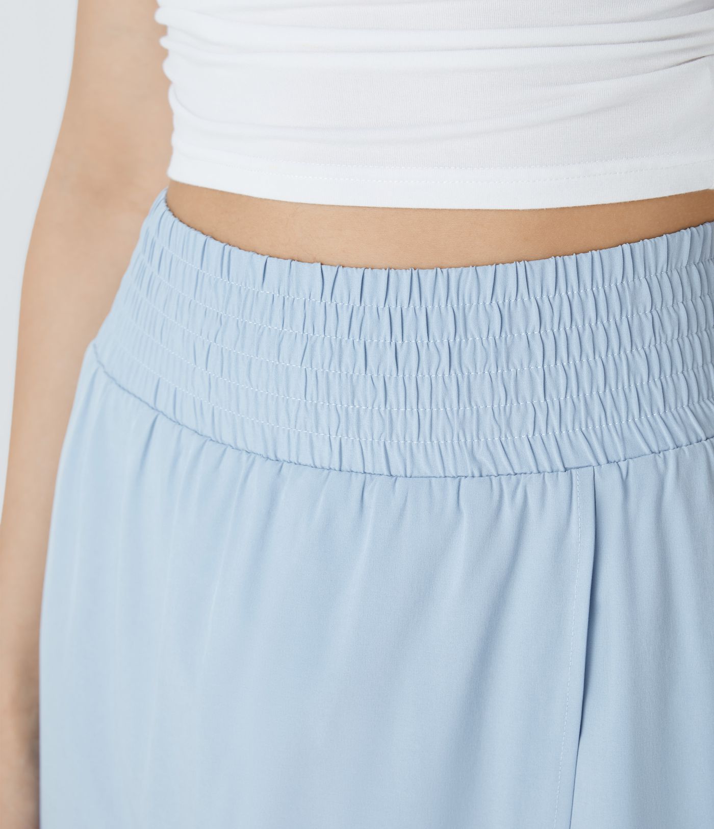 Falda maxi Breezeful™ fluida secado rápido bolsillo lateral 2 en 1 dividida tiro alto