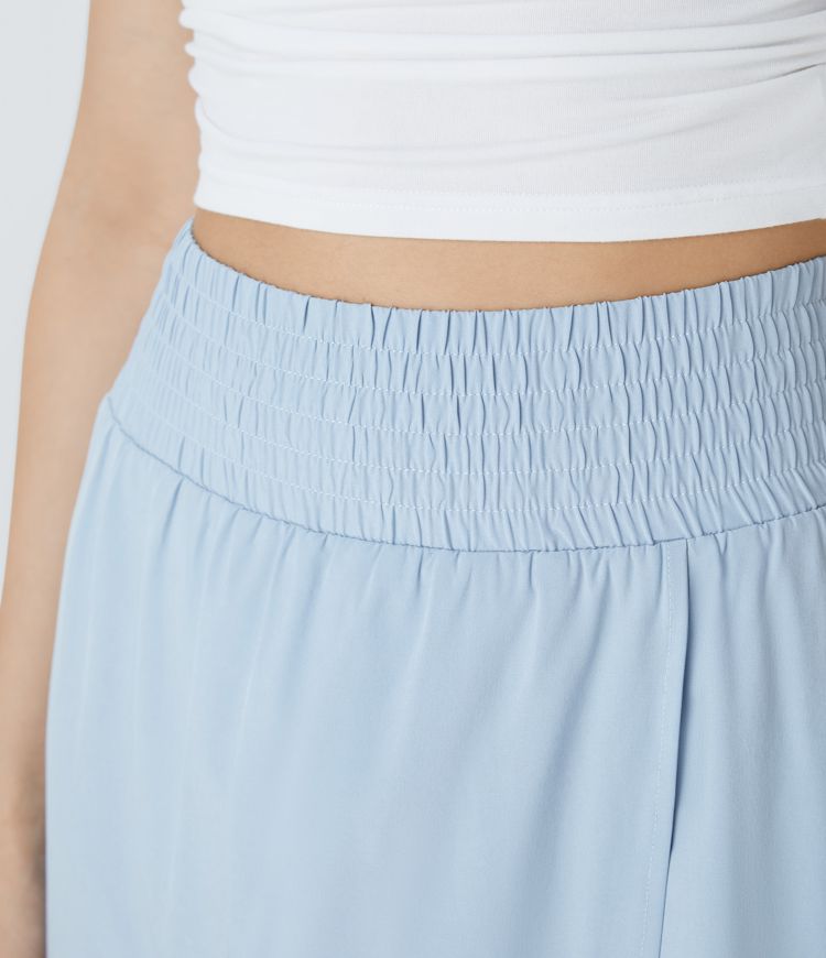 Falda maxi Breezeful™ fluida secado rápido bolsillo lateral 2 en 1 dividida tiro alto