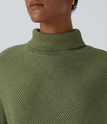 Pull cape de travail à col montant, manches longues et ourlet asymétrique