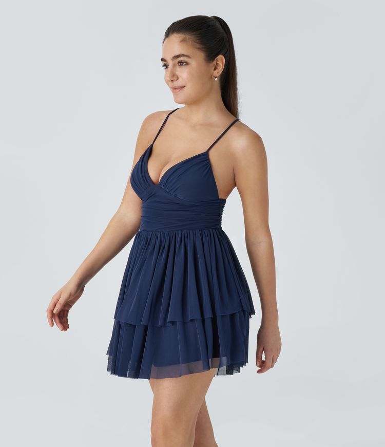 Vestido mini de malla con capas con cordones