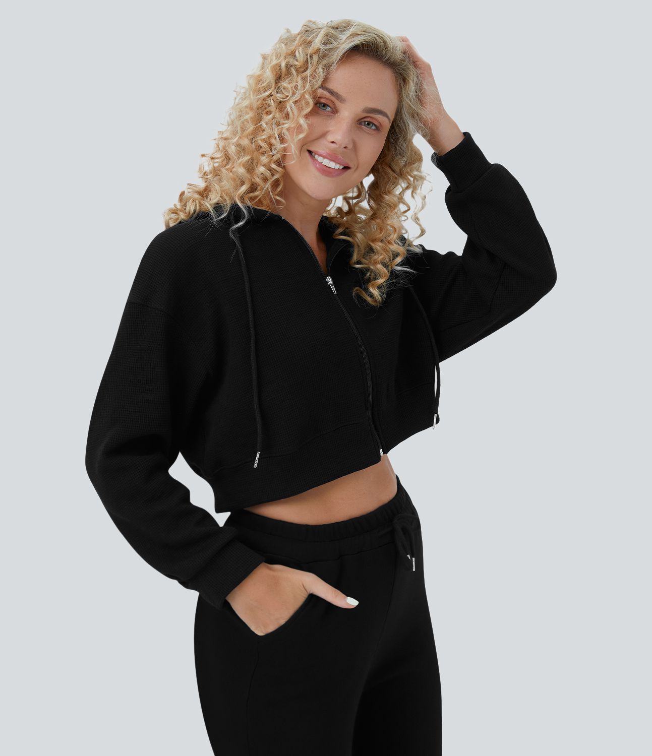 Sudadera deportiva algodón recortada cremallera cordón capucha gofre